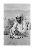 Seated portrait of a tribesman ...