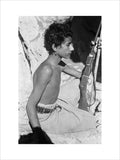 Seated profile portrait of a ...