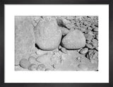 Three large boulders covered in ...