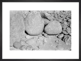 Three large boulders covered in ...