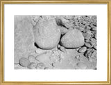 Three large boulders covered in ...