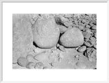 Three large boulders covered in ...