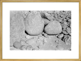 Three large boulders covered in ...