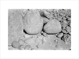 Three large boulders covered in ...