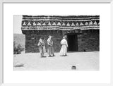 View of three men standing ...