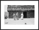 View of three men standing ...