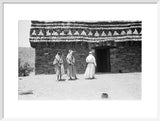 View of three men standing ...