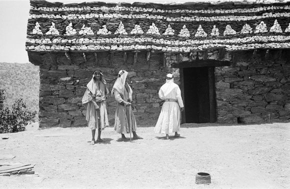 View of three men standing ...