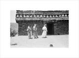 View of three men standing ...