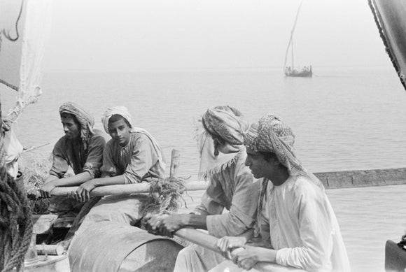 Portrait of sailors rowing a ...