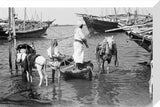View of water sellers unloading ...