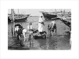 View of water sellers unloading ...