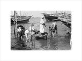 View of water sellers unloading ...