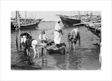 View of water sellers unloading ...