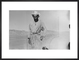Three-quarter length portrait of one ...