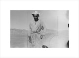 Three-quarter length portrait of one ...