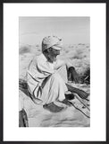 Seated profile portrait of an ...