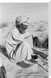 Seated profile portrait of an ...
