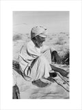 Seated profile portrait of an ...