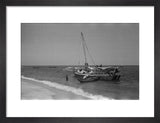 View of men unloading dhows ...