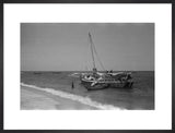 View of men unloading dhows ...
