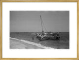 View of men unloading dhows ...