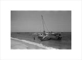 View of men unloading dhows ...