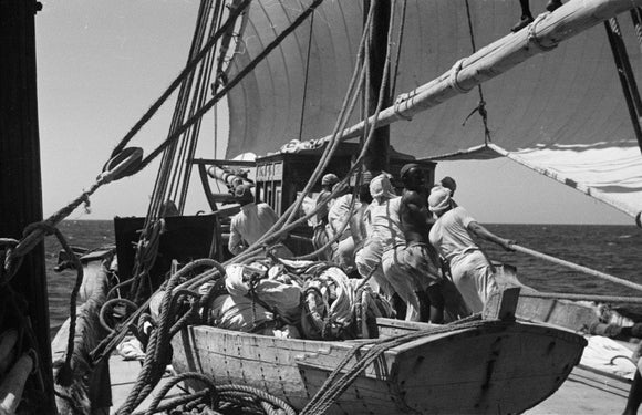 View of sailors hoisting the ...