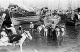 View of water sellers unloading ...
