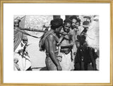 Group portrait of tribesmen standing ...