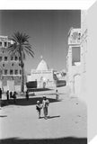 View of locals walking down ...