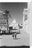 View of locals walking down ...