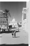 View of locals walking down ...