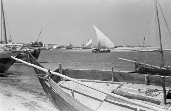 View of dhows (sailboats) beached ...