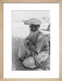 Seated portrait of the Imam ...