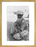 Seated portrait of the Imam ...