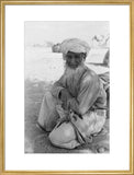 Seated portrait of the Imam ...