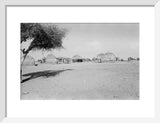View of round huts with ...