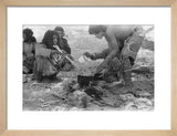 Wilfred Thesiger's party preparing food. ...