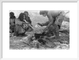 Wilfred Thesiger's party preparing food. ...