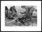 Wilfred Thesiger's party preparing food. ...