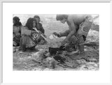 Wilfred Thesiger's party preparing food. ...