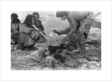 Wilfred Thesiger's party preparing food. ...