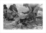 Wilfred Thesiger's party preparing food. ...