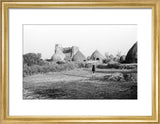 View of round huts and ...
