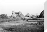 View of round huts and ...