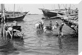 View of water sellers unloading ...