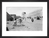 View of townspeople walking on ...