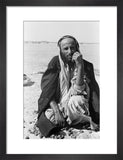 Seated portrait of a tribesman ...