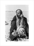 Seated portrait of a tribesman ...